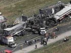 Burned and mangled vehicles strew Highway 401 near Windsor after a crash that involved at least 63 vehicles and killed seven people last September.