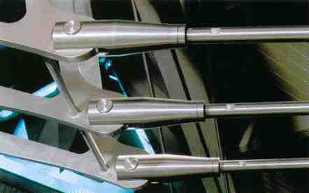 Clevis-yoke connection in roof truss, made in polished stainless steel.