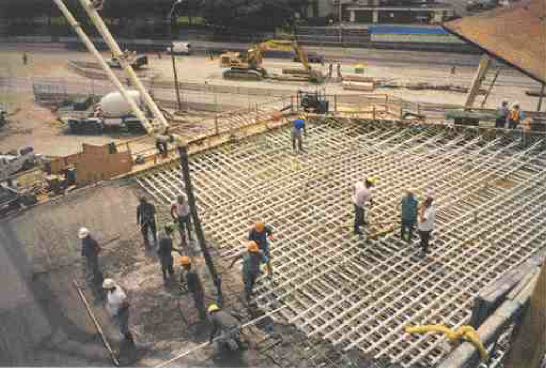 Constructing the 17 metre x 17 metre post-tensioned slab structural system.