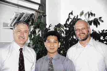 AWARD OF MERITFast + Epp, Vancouver, for the Roof of the Pacific Canada Extension, Vancouver Aquarium. Above, l. to r.: Gerald A. Epp, P.Eng., Tim Lam, P.Eng., Brian Woudstra.