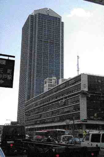 P. TimlerKobe City Hall in Japan following the great earthquake of 1995. The entire fifth floor collapsed in the older low-rise portion of the building, while the adjacent tower with steel plate shear wall system survived.
