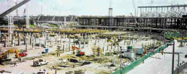 Roger Sing/UMAThe $3.5 billion expansion project at Toronto Pearson airport is well under way. Shown are the pillars of the new main parking garage, along with sections of the new terminal itself. To the right is one of the many roads on the construction site that have to be kept open during construction to allow passengers access.