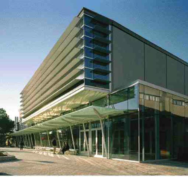 The entire building envelope and structure is designed to minimize energy use; on the south facade deep shading devices keep out the sun and yet allow transparency.
