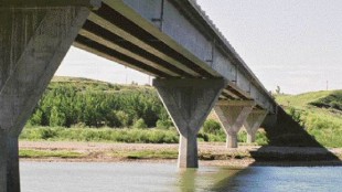Bridge with 2800-mm deep precast concrete girder and identical splayed piers.