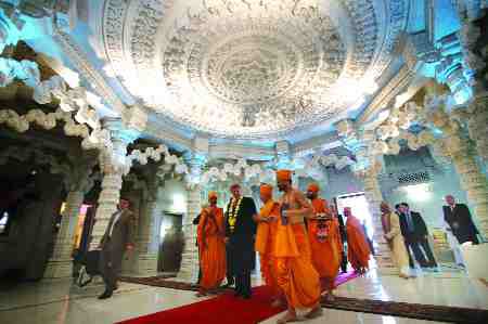 Prime Minister Stephen Harper and BAPS' leader, Pramukh Swami Maharaj, inside the main prayer hall on opening day.
