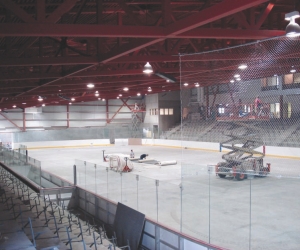 Above: the arena; heat rejected while producing the ice is used for radiant floor heating in the grandstand.