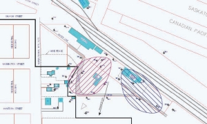 Site plan showing petroleum hydrocarbon (pink shaded area) and fertilizer (blue shaded area) contaminant plumes.