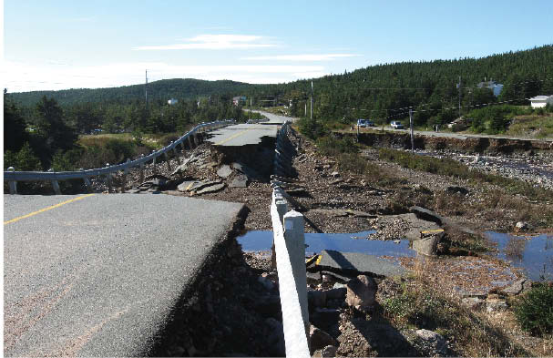 Road washed out in Amherst Cove.  Photographer Chad Fisher, Rutter Engineering.