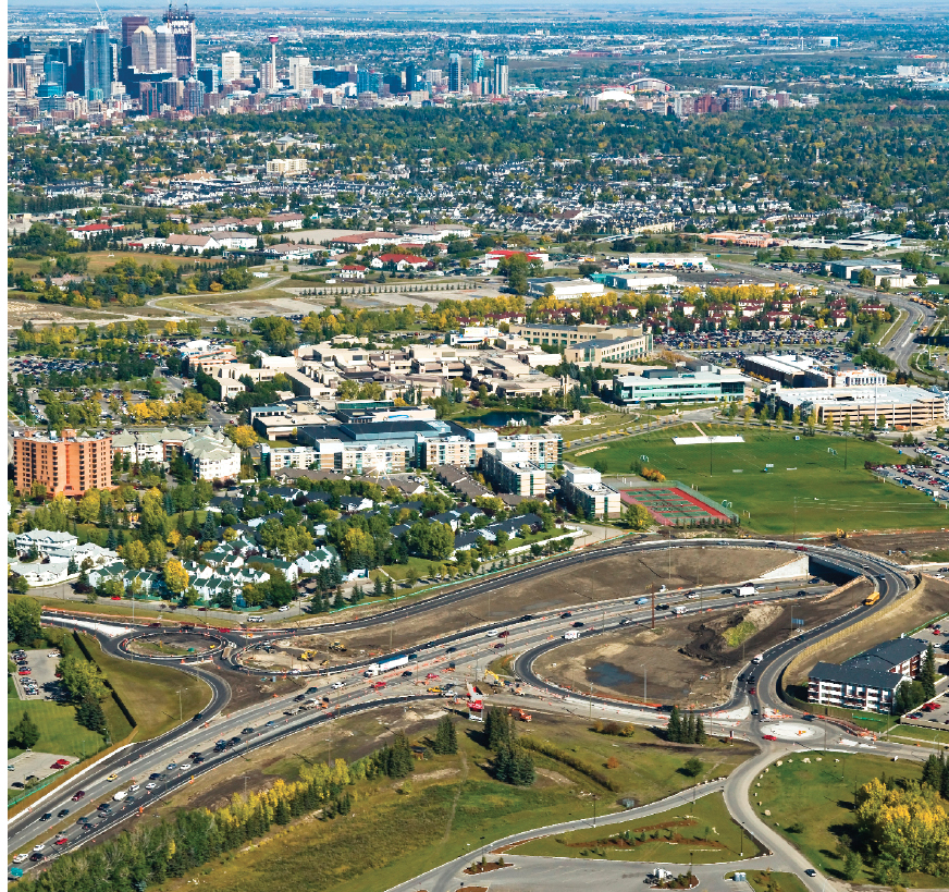 Reconfigured interchange, with roundabout access ramps to detour bridge (at right) over Glenmore Trail.