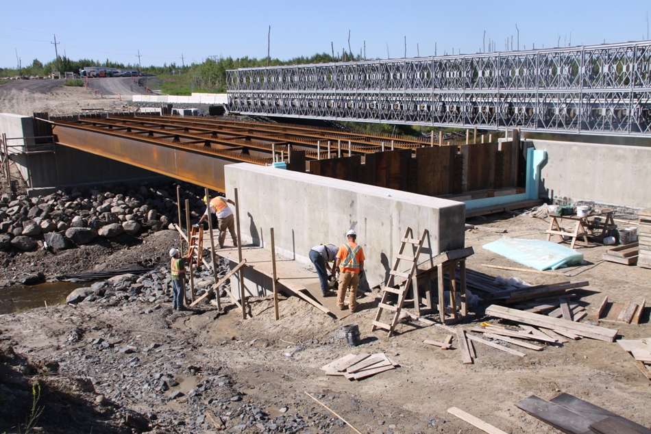 Wanipigow Bridge, one of the bridges on Manitoba's new permanent road system along the east side of Lake Winnipeg, under construction last summer. The bridge was completed in time for this winter season. Photo courtsy East Side Road Authority, Government of Manitoba.