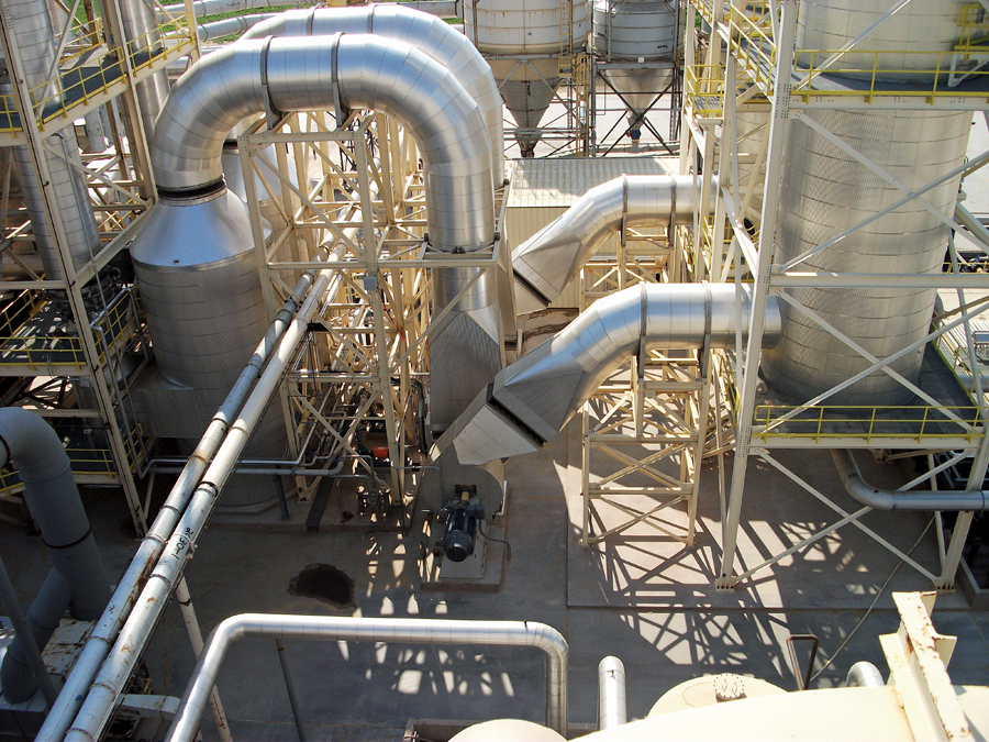 Photocatalytic Gas Treatment units at the Uniboard Pfleiderer plant in Moncure, North Caroline. The PGT process was developed by exp to reduce VOC emissions during manufacturing. It won the 2012 Schreyer Award in the Canadian Consulting Engineering Awards.