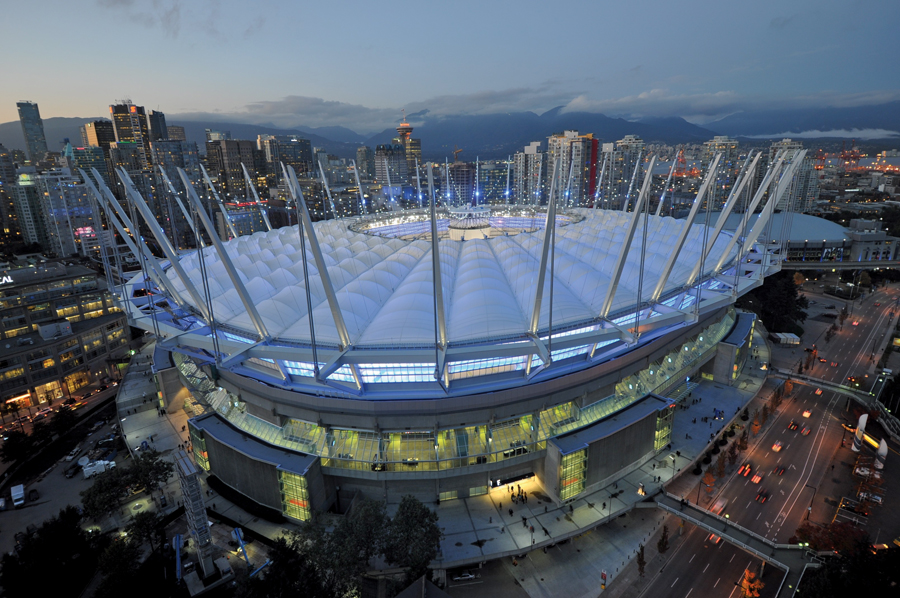 Stadium with new roof in open position; it is the largest cable-supported retractable membrane roof in the world.