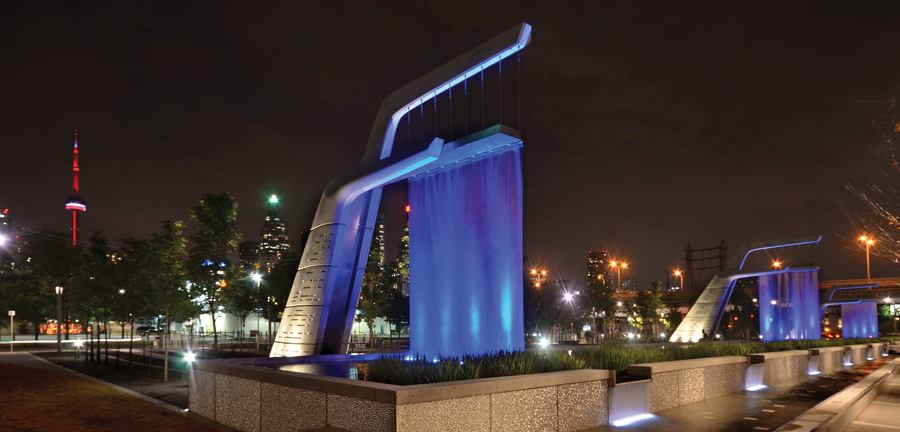 The installation's scrim walls are brightly lit against Toronto's night sky. Image courtesy Waterfront Toronto.