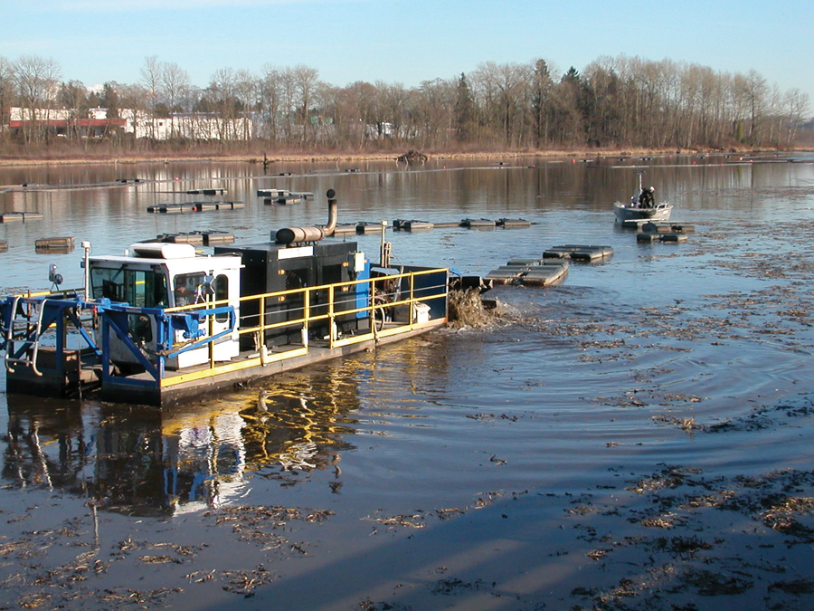 Dredging in process; the lake was divided into 16 dr3ede zones, partly to contain turbidity.