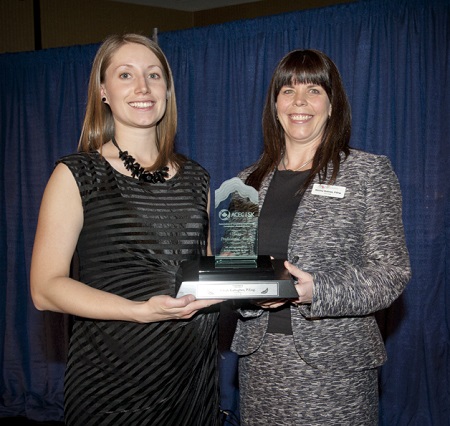 Elleah Gallagher (left) a structural engineer with J.C. Kenyon Engineering, won the Young Professional Award from ACEC-SK. She accepts the award from Stormy Holmes, P.Eng., ACEC-SK Vice Chair.