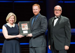 Mark Byram, P.Eng.  (centre) of Levelton receiving the Young Professional Award at the ACEC-BC awards in Vancouver on April 10. Photo: ACEC-BC/Kim Stallknecht. At right is Keith Sashaw, president and CEO of ACEC-BC.